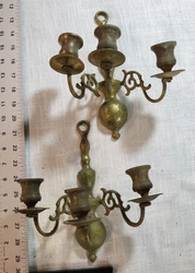 Each sconce boasts three arms, perfectly designed to hold taper candles (not included), adding an enchanting glow to...