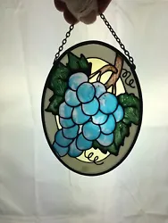 Hand painted Stained Glass Suncatcher Oval Grape Bunch 4 1/4” Tall X 3 1/4” Wide. This is preowned. No cracks or...