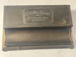 This vintage stamp holder from the White Son Company is a must-have for collectors of desktop items. Featuring a 1923...