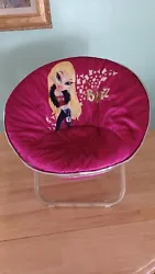 This is a Bratz childs chair; it has Cloe on it; very pretty; folds for storage or travel; the tag gives measurements...