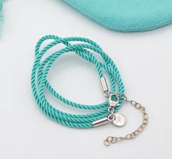 Authentic Tiffany Silk Cord. © Tiffany&Co. 925. Tiffany & Co. Pouch is Included. Sterling Silver Lobster Clasp and...