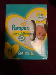 pampers swaddlers New born 84 count 2 boxes of diapers .