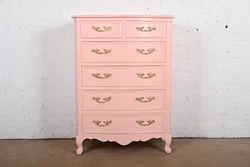 By Kindel Furniture. An exceptional French Provincial Louis XV style six-drawer highboy dresser or chest of drawers....