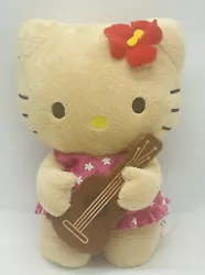 Hello Kitty Sanrio 4” Hawaii Tan Plush Ukulele Hula 2013 Plumeria Flower Charm.  In used condition. Please look at...