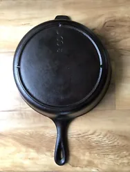 This skillet has been cleaned and seasoned. Chicken fryer skillet has no lid. No visible cracks and sets flat.