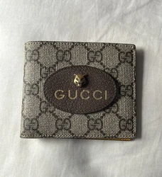Gucci Neo Vintage GG Supreme Bifold Wallet.