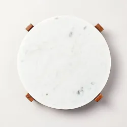 •12.5in wood and marble trivet •Supported on a wooden frame with 4 legs •Round marble base •Natural marble and...
