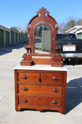 This gorgeous Charming Walnut Victorian Marble Top Dresser with Mirrored Top has a beautiful finish and exudes all of...