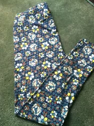 BNWOT LuLaRoe TC leggings blue background, white & yellow floral pattern with orange accents. (Note: I am not nor have...