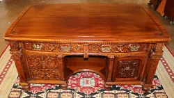 This partners desk was made in England in the late 19th century and is very well made! The carvings are a work of art...