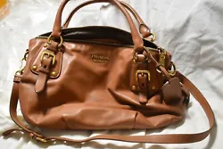 Prada Tan Leather Double Handle with Dust bag. Stain on the bottom of the lining, see pictures. Pen mark near one of...