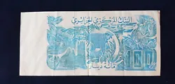 billet de 100 dinars   sans coupures  -  2 trous dépingles - légers plis  frais englobant envoi - emballage -...