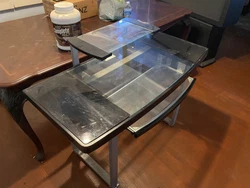 Glass desk. Pretty good condition. Needs a dusting. Still sturdy. Cleaning out storage room. Must go. If interested in...