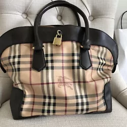 (Authentic Burberry Haymarket dark brown leather hand bag. 2) had a crossbody strap but is missing but it’s not...