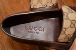 Genuine Leather and Canvas. Not include Boxes but has Dust bags.