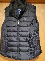 U.S. Polo Assn. Black Vest Size L.  Like new condition.  Quality made garment.