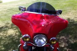 The polycarbonate material allows you to flex it to the exact contour of your HD 5 hole batwing fairing. Made of Lexan...