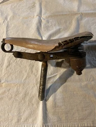 For sale is a pre-war/vintage bicycle/bike seat and although I am not 100% on the identification, I believe it is...