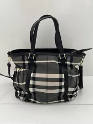 This is a BURBERRY diaper bag in black, white and gray nova plaid fabric and leather. 100% AUTHENTIC BURBERRY BAG. -...