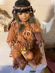 Antique Porcelain doll which has been on a shelf for years 