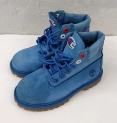 Timberland X Champion Blue Boots Toddler 10.  Soft Leather   Used condition  Excellent tread on the bottom