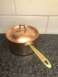 Preowned Paul Revere copper 1 quart sauce pan with lid. Sits flat and in very good working condition. Normal sign of...