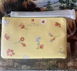 Coach Corner Zip Wristlet Mystical Floral Print Silver Yellow Leather Canvas New. Brand new with tags any questions...