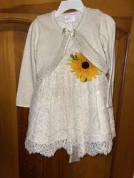 2T girls flower girl dress. Lace dress with sunflower. Used once for a wedding. Great condition. Smoke free home.
