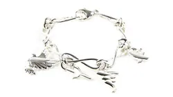 TIFFANY & CO. Loving Heart - Charm Bracelet. Bracelet Length: 7.75