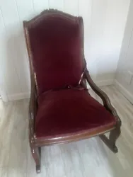 Rocking Chair. 34 1/2” HEIGHT Back center, to highest point of crest. wine maroon velvet seat with trim. 29 1/2”...