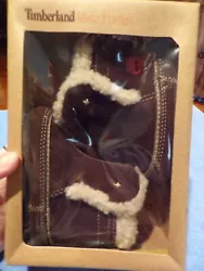 B738- D0123. Chocolate brown leather lined with a cream colored sherpa. This is for a new pair of TIMBERLAND baby...