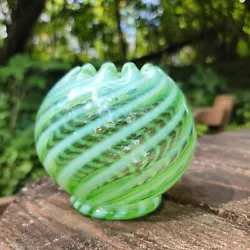This is a lovely 1930s Fenton Green Opalescent White Swirl Crimped Top Rose Bowl 4.5
