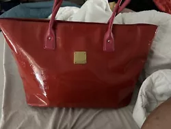 MCM Red Patent Tote. Condition is Pre-owned. Shipped with USPS Priority Mail. I bought it used. No major call outs-- it...
