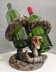 • This Rattlesnake Double Wine Bottles Holder is made of designer composite resin, hand painted and polished...