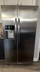 Side by side refrigerator unsure of age came with house 5 years ago. Ice/water dispenser latch doesn’t engage but...
