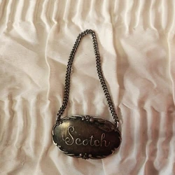 For your consideration is a truw antique Victorian Sterling Silver Bottle Tag with Script font that says 