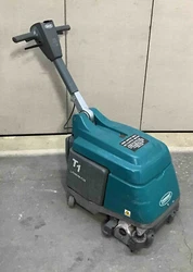 TENNANT T1 Lithium Ion BATTERY OPERATED FLOOR SCRUBBER. Working condition but is well used and will need cleaned and...