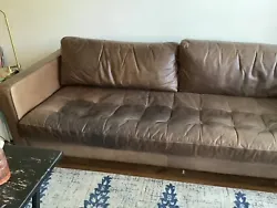 Used Article brown leather couch. Lived with a cat