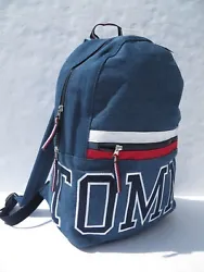 TOMMY HILFIGER. Blue - White - Red - Navy Blue. Exterior zipped pocket. Zip top closure with two zipper pulls. 100%...