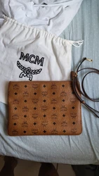Beautiful like new cognac mcm crossbody pouch. No wear or tear on the bag. Has dustbag. Authentic mcm!