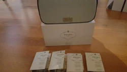 Infusion DIris. Prada Milano Satin Travel Case. Made exclusively for Prada Parfums.05fl oz/1.5ml Spray Sample. • Let...