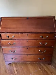 Antique secretary desk with drawers.