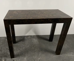 This is a show stopper of a table! We are selling this beautiful, brown, marble look laminate, high gloss veneer...
