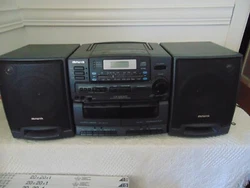 MODEL CA DW305U. CD AM-FM RADIO DOUBLE CASSETTE SYSTEM.