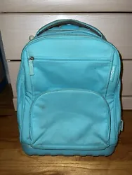 Pacific Gear Teal Blue Rolling backpack. Some wear on the wheels and back.