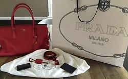 Prada was founded in 1913 in Milan by Mario Prada and was originally known as Prada Brothers. About Prada Rolled tote...