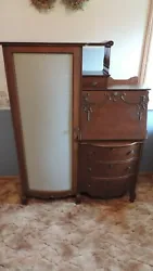 NICE CONDITION OVERALL--UPPER RIGHT CORNER OF SCROLL ON DESK DOOR IS MISSING. HAS 3 DRAWERS BELOW DESK AREA WITH NICE...