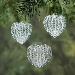 A lovely gift. Holiday lights reflect on the surface of these Spun Glass Heart Christmas Ornaments to make them...