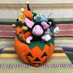 Disney Halloween Plush Pumpkin Centerpiece with Pooh, Tigger, Piglet and Eeyore. About 9 in tall 7 in wide nice hard to...