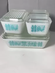 This set of 4 dishes with 4 original lids is in very good condition.